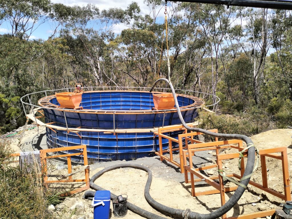 blue concrete water tank completion
