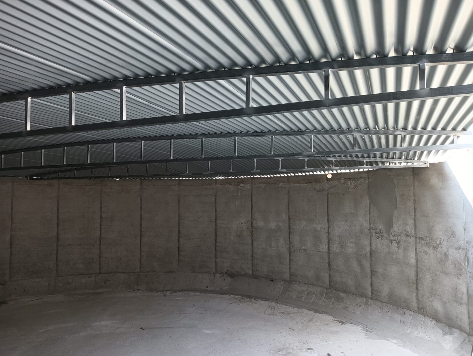 the inside of a concrete water tank